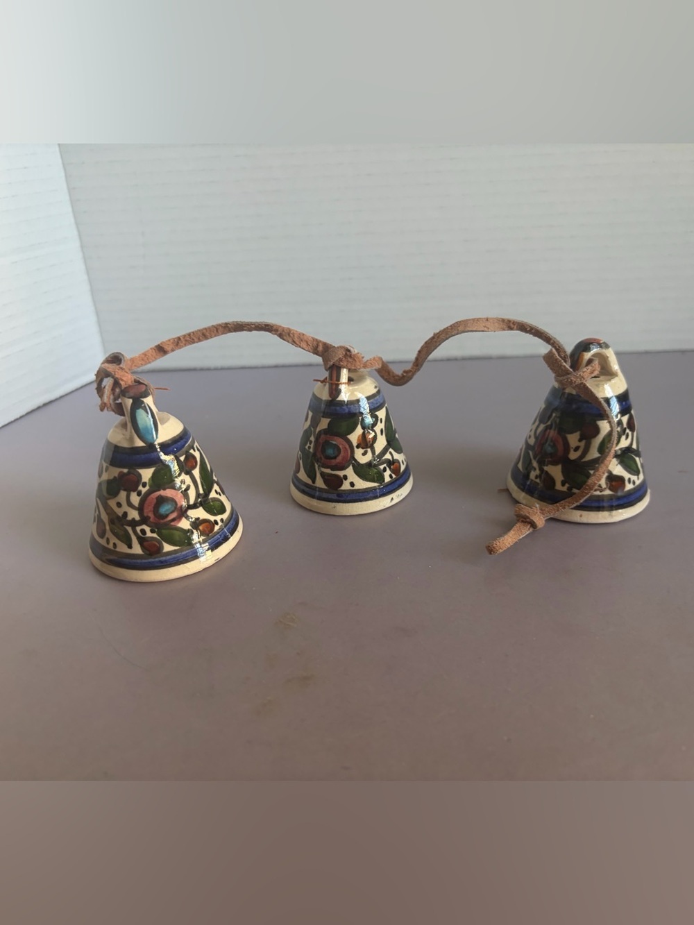 A Classic Handpainted Ceramic Bell Garland